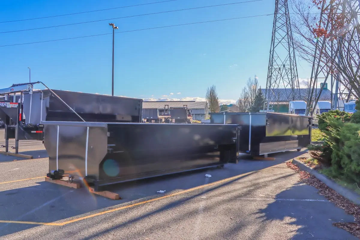 Roll-off dumpster ready for waste disposal at job site for 2 Yard Dumpster Rental in Aberdeen